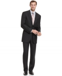 CNeed more versatility from your tailored wardrobe? This solid charcoal suit from Alfani comes with two pairs of flat front pants. CNeed more versatility from your tailored wardrobe? This solid charcoal suit from Alfani comes with two pairs of flat front pants.