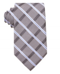 Welcome a return to buttoned-up prepster style in your wardrobe with this crisp plaid tie from Perry Ellis. Welcome a return to buttoned-up prepster style in your wardrobe with this crisp plaid tie from Perry Ellis.