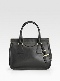 Rich calfskin fitted with a structured frame-top and luggage tag detail.Double top handles, 5 drop Snap top closure Protective metal feet One inside zip pocket Four inside open pockets Leather lining 11W X 9½H X 5½D Made in Italy Rich calfskin fitted with a structured frame-top and luggage tag detail.Double top handles, 5 drop Snap top closure Protective metal feet One inside zip pocket Four inside open pockets Leather lining 11W X 9½H X 5½D Made in Italy
