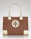 Tory Burch's signature tote is sized down for the smaller-scale daytime demands, updated in felt with leather trims.