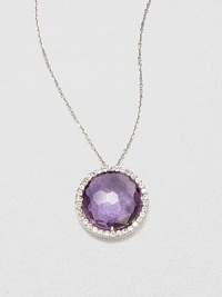 A faceted round amethyst stone surrounded by dazzling white sapphires set in 14k white gold on a delicate link chain. AmethystWhite sapphire14k white goldLength, about 16Pendant size, about .5 Spring ring closureMade in USA A faceted round amethyst stone surrounded by dazzling white sapphires set in 14k white gold on a delicate link chain. AmethystWhite sapphire14k white goldLength, about 16Pendant size, about .5 Spring ring closureMade in USA
