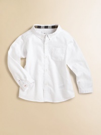 A wardrobe staple in crisp cotton with a check collar lining and embroidered Burberry logo.Button-down collarLong sleeves with button cuffsButton-frontPatch pocketCottonMachine washImported Please note: Number of buttons may vary depending on size ordered. A wardrobe staple in crisp cotton with a check collar lining and embroidered Burberry logo.Button-down collarLong sleeves with button cuffsButton-frontPatch pocketCottonMachine washImported Please note: Number of buttons may vary depending on size ordered.