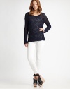 Open-stitch cotton boatneck with dropped shoulders and long dolman sleeves. BoatneckDropped shouldersLong dolman sleevesCottonDry cleanImported