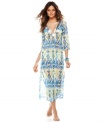 A bold, bright print gives a chic touch to INC's coverup caftan. Sequins at the collar create a sparkling effect!