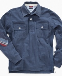 This Tommy Hilfiger long sleeve polo looks great on and off the field. This Tommy Hilfiger long sleeve polo looks great on and off the field.