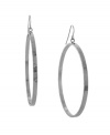 Step it up a notch in bold hoops that match with any ensemble. BCBGeneration's head-turning hoop earrings feature a polished silver tone mixed metal setting. Approximate diameter: 2-1/2 inches.
