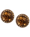 Smoky sophistication stands out on Givenchy's stud earrings. A light Colorado topaz glass stone is surrounded by pave accents. Crafted in brown gold tone mixed metal. Approximate diameter: 1-1/2 inches.