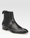 Side elastic gores and minimal detailing shapes and defines this charming chelsea boot constructed in Italy from smooth, supple calfskin leather.Leather upperLeather liningPadded insoleLeather soleMade in Italy