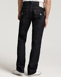 True Religion's straight leg, low rise jeans with signature horseshoes pocket styling in a bold, dark wash. True Religion's straight leg, low rise jeans with signature horseshoes pocket styling in a bold, dark wash.