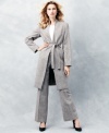 Calvin Klein uses sleek lines and a belted waist to craft an elegant, elongated tweed jacket unlike any other!