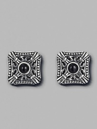 Polished onyx centerpieces stand in bold contrast to the hand-forged sterling silver that surrounds them. Sterling silver Onyx About 1 square Made in USA Polished onyx centerpieces stand in bold contrast to the hand-forged sterling silver that surrounds them. Sterling silver Onyx About 1 square Made in USA