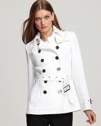 White twill offers up a clean, refreshing slate on this Burberry Brit jacket, featuring a double breasted and belted silhouette.