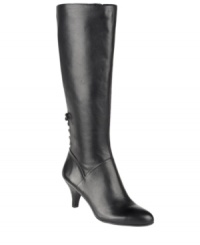 You'll look divine and refined in Naturalizer's tall Dinka boots. Crafted in suede, they feature a delicate lace-up closure detail in back. Pair them with a slim skirt to complement their lean look. You'll look divine and refined in Naturalizer's tall Dinka boots. Crafted in suede, they feature a delicate lace-up closure detail in back. Pair them with a slim skirt to complement their lean look.