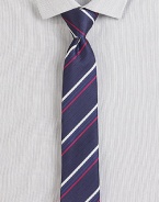 Bold stripe pattern adorns thi handsome dress staple of fine Italian silk.SilkAbout 2¼ wideDry cleanMade in Italy