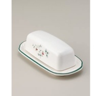 A charming addition to your Winterberry collection, this covered butter dish from Pfaltzgraff's holiday collection of dinnerware and dishes offers an elegantly coordinated look for holiday entertaining. A traditional holly berry pattern is painted on the cover's sides, and the dish's simple green rim completes the effect. (Clearance) A charming addition to your Winterberry collection, this covered butter dish from Pfaltzgraff's holiday collection of dinnerware and dishes offers an elegantly coordinated look for holiday entertaining. A traditional holly berry pattern is painted on the cover's sides, and the dish's simple green rim completes the effect. (Clearance)
