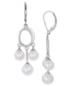Refined elegance. Majorica's pair of drop earrings radiates class with organic man-made pearls (7-8 mm). Crafted from sterling silver. Approximate drop: 2-1/2 inches.