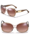 A modern design and luxe detailing defines these fashion-forward frames from MICHAEL Michael Kors.