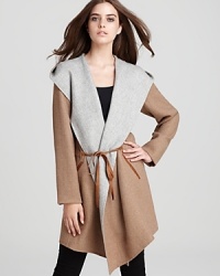 Versatile and layer-perfect, this sophisticated Rebecca Taylor coat flaunts a sumptuous-looking wrap front profile in a soft wool blend to carry you now through the colder months ahead. Versatile and layer-perfect, this sophisticated Rebecca Taylor coat flaunts a sumptuous-looking wrap front profile in a soft wool blend to carry you now through the colder months ahead.