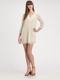 Delicate swiss-dot chiffon styled with lace embroidery in an airy split-neck shift.Embroidered yokeBell sleevesPleats at bodiceSlip liningAbout 33 from shoulder to hemViscoseDry cleanImportedModel shown is 5'9 (175cm) wearing US size Small. Delicate swiss-dot chiffon styled with lace embroidery in an airy split-neck shift.Embroidered yokeBell sleevesPleats at bodiceSlip liningAbout 33 from shoulder to hemViscoseDry cleanImportedModel shown is 5'9 (175cm) wearing US size Small.