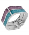Double your pleasure. This pair of bangles from Betsey Johnson is crafted from rhodium-plated mixed metal with purple and teal glitter accents, as well as silver-tone details for a style infusion. Approximate diameter: 4 inches.