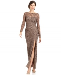 Sheer detail at the chest and sleeves, more than a smattering of sparkling sequins and a dramatic slit at the front hem make this Patra's dress stunning for special occasions. Sheer detail at the chest and sleeves, more than a smattering of sparkling sequins and a dramatic slit at the front hem make this Patra's dress stunning for special occasions.