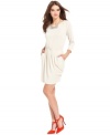 Allover subtle sparkles make this RACHEL Rachel Roy dress a super chic pick  for hot soiree style!