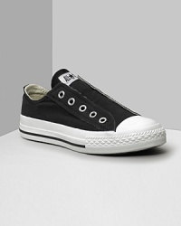 Converse All Star slip on sneakers. All the cool of the classic in a convenient slip-on. Elastic goring beneath the tongue for a perfect fit. With canvas uppers, tonal stitching and rubber sole and toe. Converse All Star slip on sneakers. All the cool of the classic in a convenient slip-on. Elastic goring beneath the tongue for a perfect fit. With canvas uppers, tonal stitching and rubber sole and toe.