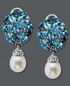 Sparkling sophistication with a hint of shimmer. Pear-cut blue topaz gemstones (4-3/8 ct. t.w.) highlight the post, while sparkling white topaz accents adorn the top of a cultured freshwater pearl (7 mm x 9 mm) in these breathtaking drop earrings. Set in sterling silver. Approximate drop: 1-1/8 inches.