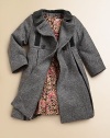 She'll battle the elements in elegant style in this wool herringbone coat with velvet detail in a double-breasted silhouette.Velvet club collarLong sleevesDouble-breasted button-frontEmpire waistPleated skirtFully linedWoolDry cleanImported Please note: Number of buttons may vary depending on size ordered. 