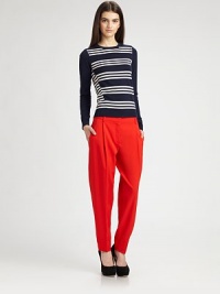 Fine wool knit in a fitted crewneck style finished with stripes from shoulder to hem.CrewneckLong sleevesPullover styleAbout 22 from shoulder to hem94% wool/6% polyesterDry cleanImportedModel shown is 5'9½ (176cm) wearing US size Small. Fine wool knit in a fitted crewneck style finished with stripes from shoulder to hem.CrewneckLong sleevesPullover styleAbout 22 from shoulder to hem94% wool/6% polyesterDry cleanImportedModel shown is 5'9½ (176cm) wearing US size Small.