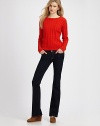 Classic cable-knit in ultra-soft Pima cotton, finished with buttons at the shoulder.CrewneckLong sleevesRibbed trimAbout 23 from shoulder to hemCottonDry cleanImportedModel shown is 5'11 (180cm) wearing US size Small.