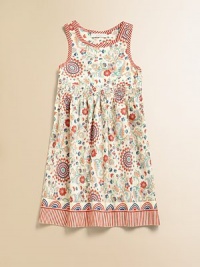 A fun take on a classic frock, this flower-printed design in pure cotton is bright and cheery.CrewneckSleevelessSide zip and shoulder buttonsSmocked waistlineA-line silhouetteStriped armholes, neck and hemCottonMachine washImported A fun take on a classic frock, this flower-printed design in pure cotton is bright and cheery.CrewneckSleevelessSide zip and shoulder buttonsSmocked waistlineA-line silhouetteStriped armholes, neck and hemCottonMachine washImported