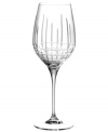 Create a stir with the classic linear cut and striking crystal elegance of the Cocktail Party wine glass from Lauren Ralph Lauren.