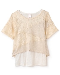 A lace zigzag top is layered over a solid tank in this sweet two-in-one from Kiddo. A lace zigzag top is layered over a solid tank in this sweet two-in-one from Kiddo.