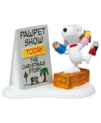 The story of Christmas unfolds like never before in Snoopy's very own pawpet show. A must-see in Peanuts Village, from Department 56. The story of Christmas unfolds like never before in Snoopy's very own pawpet show. A must-see in Peanuts Village, from Department 56.