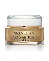 Skinleÿa is an anti-aging lift foundation. This foundation is formulated like an effective anti-aging skincare treatment to help skin preserve its youth capital by:- Smoothing the skin's surface- Reviving complexion radiance- Combating the signs of aging - Moisturizing and softening the skinWhile offering exceptional make-up performance thanks to a texture designed to blend naturally with the skin and restore luminosity. It has smoothing, unifying and luminous effects.The complexion is refreshed, the skin is beautifully enhanced and radiance is given a new lease of life. Skinleÿa comes in 9 ultra-natural shades for all skin tones.DIRECTIONS FOR USE: Skinleÿa is very easy to apply, using the fingertip or brush. Application using the brush allows a subtle, natural finish with no caking. Apply Skinleÿa with smooth strokes using the Foundation Brush, strating in the middle and blending outwards towards the hairline, ears and neck. Avoid drawing attention to hollows and shadows (nasolabrial furrows, eye contour, etc.)Can be used alone or a touch of powder applied afterwards. Skinleÿa is an anti-aging lift foundation. This foundation is formulated like an effective anti-aging skincare treatment to help skin preserve its youth capital by:- Smoothing the skin's surface- Reviving complexion radiance- Combating the signs of aging - Moisturizing and softening the skinWhile offering exceptional make-up performance thanks to a texture designed to blend naturally with the skin and restore luminosity. It has smoothing, unifying and luminous effects.The complexion is refreshed, the skin is beautifully enhanced and radiance is given a new lease of life. Skinleÿa comes in 9 ultra-natural shades for all skin tones.DIRECTIONS FOR USE: Skinleÿa is very easy to apply, using the fingertip or brush. Application using the brush allows a subtle, natural finish with no caking. Apply Skinleÿa with smooth strokes using the Foundation Brush, strating in the middle and blending outwards towards the hairline, ears and neck. Avoid drawing attention to hollows and shadows (nasolabrial furrows, eye contour, etc.)Can be used alone or a touch of powder applied afterwards.