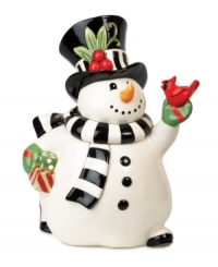 With a feathered friend in-hand and cookies in his belly, Frosty makes holiday treats extra merry as this cute, kid-friendly cookie jar from Fitz and Floyd. With a feathered friend in-hand and cookies in his belly, Frosty makes holiday treats extra merry as this cute, kid-friendly cookie jar from Fitz and Floyd.