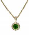 Totally glamorous green. EFFY Collection's beautiful round pendant highlights an emerald center stone (1/3 ct. t.w.) surrounded by diamond accents. Set in 14k gold. Approximate length: 18 inches. Approximate drop length: 1/2 inch. Approximate drop width: 3/10 inch.
