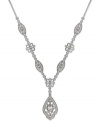 Look pretty in vintage-chic with Eliot Danori's Ella Y necklace. Intricate patterns shine with sparkling crystals and cubic zirconias (3/4 ct. t.w.). Crafted in rhodium-plated silver tone mixed metal. Approximate length: 16 inches + 2-inch extender. Approximate drop: 4-1/2 inches.