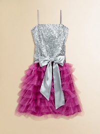 A dazzling frock, bejeweled with a sequined bodice, sash tie and sparkly ruffled skirt for a stunning ensemble.Straight necklineSleeveless with spaghetti strapsBack zipperWaistband with sashFull, tiered ruffle skirtFully linedPolyesterHand washMade in the USA of imported fabric A dazzling frock, bejeweled with a sequined bodice, sash tie and sparkly ruffled skirt for a stunning ensemble.Straight necklineSleeveless with spaghetti strapsBack zipperWaistband with sashFull, tiered ruffle skirtFully linedPolyesterHand washMade in the USA of imported fabric