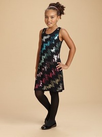 A dazzling knit sheath embellished with colorful sequins.Scoop neckSleevelessHem falls above the knee95% viscose/5% spandexHand washImported A dazzling knit sheath embellished with colorful sequins.Scoop neckSleevelessHem falls above the knee95% viscose/5% spandexHand washImported