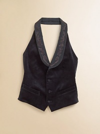 A fitted tuxedo vest is tailored in luxurious velvet with classic detailing and an embroidered twill collar for a heritage-inspired look.Twill shawl collarSleevelessHalter silhouetteFour-button frontWelt pockets at hips and chestAdjustable back tabViscose/SilkDry cleanImportedHeadband shown not sold Please note: Number of buttons may vary depending on size ordered. A fitted tuxedo vest is tailored in luxurious velvet with classic detailing and an embroidered twill collar for a heritage-inspired look.Twill shawl collarSleevelessHalter silhouetteFour-button frontWelt pockets at hips and chestAdjustable back tabViscose/SilkDry cleanImportedHeadband shown not sold Please note: Number of buttons may vary depending on size ordered.