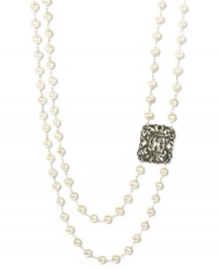 Elegant and sophisticated, this stunning two-row necklace combines cultured freshwater pearls (5-1/2-6 mm) with a marcasite-accented spacer (5/8 ct. t.w.). Set in sterling silver. Approximate lengths: 18 inches and 21 inches. Elegant and sophisticated, this stunning two-row necklace combines cultured freshwater pearls (5-1/2-6 mm) with a marcasite-accented spacer (5/8 ct. t.w.). Set in sterling silver. Approximate lengths: 18 inches and 21 inches.