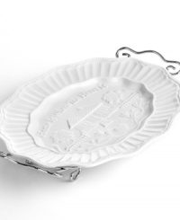 Embossed with Home Is Where The Heart Is and a quaint country scene, this sentimental bread tray from Siena's collection of serveware and serving dishes makes a beautiful hostess or housewarming gift. A beaded edge and fluted detail look delicate in durable, dishwasher-safe porcelain from Godinger. Embossed with Home Is Where The Heart Is and a quaint country scene, this sentimental bread tray from Siena's collection of serveware and serving dishes makes a beautiful hostess or housewarming gift. A beaded edge and fluted detail look delicate in durable, dishwasher-safe porcelain from Godinger.