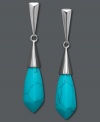 Silver bullets. A sterling silver post setting and teardrop-shaped turquoise (10 mm x 20 mm) combine on these sleek drop earrings. Approximate drop: 2 inches.