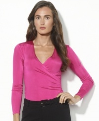 Sleek and stylish in a stretch jersey construction, Lauren Ralph Lauren's versatile top features a faux-wrap silhouette for infallible style. Sleek and stylish in a stretch jersey construction, Lauren Ralph Lauren's versatile top features a faux-wrap silhouette for infallible style.