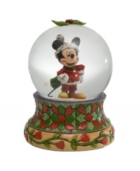 Jim Shore brings his unique folk art-inspired artistry to a beloved American icon in celebration of the holiday season. Holiday Mickey snow globe is sure to charm everyone on your list. Jim Shore brings his unique folk art-inspired artistry to a beloved American icon in celebration of the holiday season. Holiday Mickey snow globe is sure to charm everyone on your list.