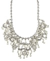 All eyes on you. Givenchy's dramatically-glamorous bridal necklace features a sweet mix of glass pearls and accents that will unfold delicately at your neckline. Crafted in silver tone mixed metal. Approximate length: 16 inches. Approximate drop: 3 inches.