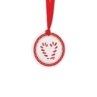 Festive and extra sweet,Kosta Boda's Candy Cane ornament makes a charming holiday gift.