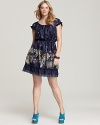 Delicate blossoms dart across this Johnny Was Collection Plus dress for a feminine addition to your summer repertoire.